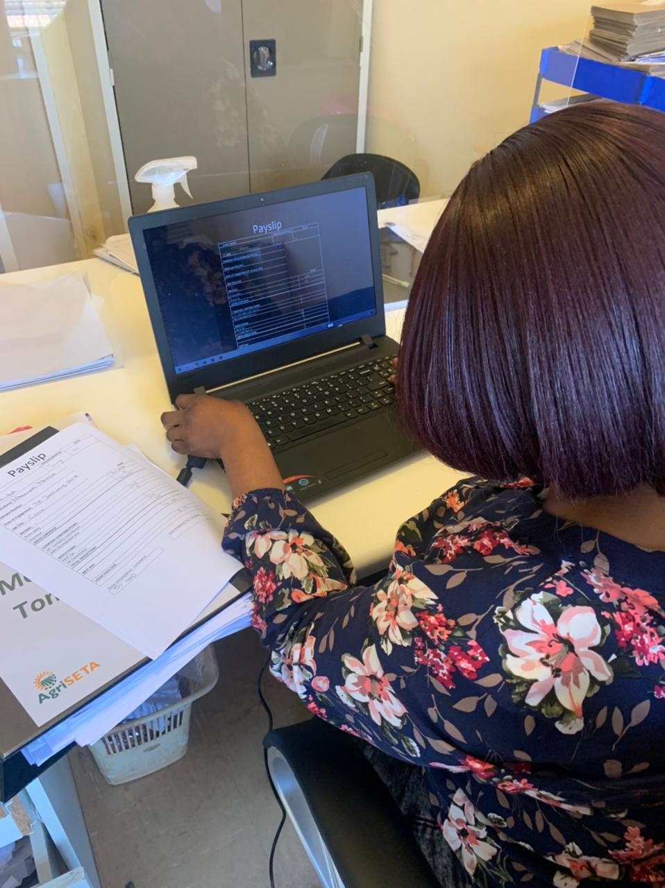 Mabunda Nomsa from Walda busy preparing Payslips.
